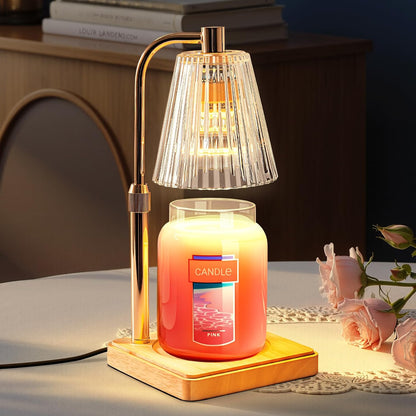 Gold candle warmer lamp warming a large jar candle