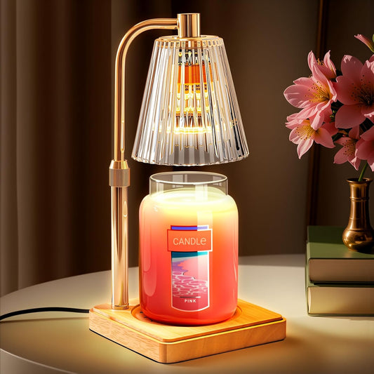 Aura Candle Warmer Lamp in gold with fluted glass shade warming a jar candle